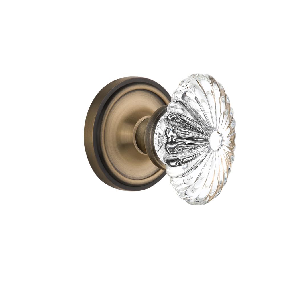 Nostalgic Warehouse CLAOFC Privacy Knob Classic Rose with Oval Fluted Crystal Knob in Antique Brass